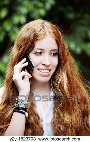 Young girl with mobile phone. View Large Photo Image Stock Image - Young girl with mobile phone.. Fotosearch