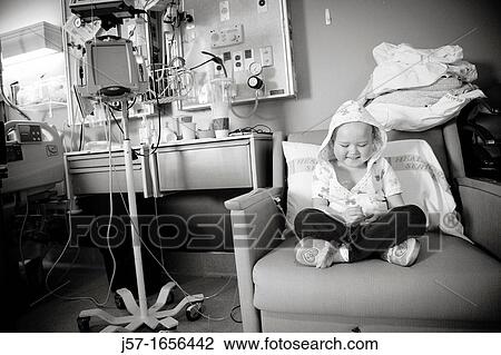 Young girl with pediatric cancer leukimia receiving an infusion in her hospital bed at Seattle Childrens Hospital, USA View Large Photo Image Stock Image - Young girl with pediatric cancer leukimia receiving an infusion in her hospital bed at Seattle Childrens Hospital, USA. Fotosearch