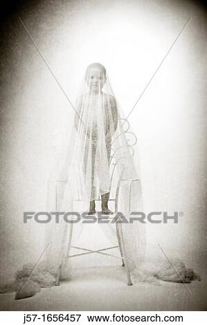 Young girl with pediatric cancer playing in studio with scarf View Large Photo Image Stock Photo - Young girl with pediatric cancer playing in studio with scarf. Fotosearch
