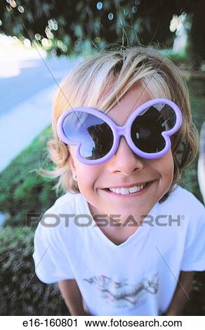 Young girl with play glasses View Large Photo Image Stock Image - Young girl with play glasses. Fotosearch