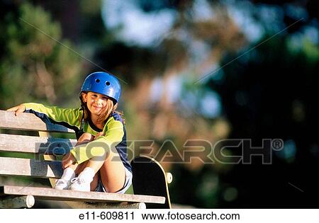 Young girl with skateboard View Large Photo Image Stock Image - Young girl with skateboard. Fotosearch