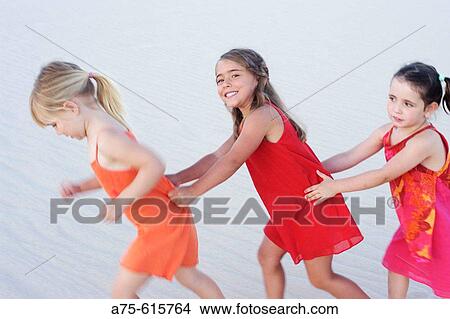 Picture - Young girls playing. Fotosearch
