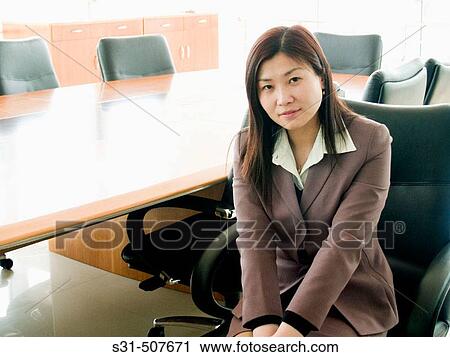 Young good looking asian businesswoman View Large Photo Image Stock Image - Young good looking asian businesswoman. Fotosearch