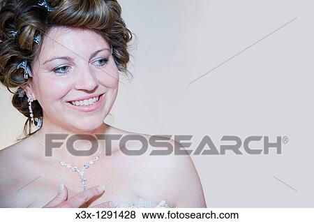 Young happy bride in curlers View Large Photo Image Stock Photo - Young happy bride in curlers. Fotosearch