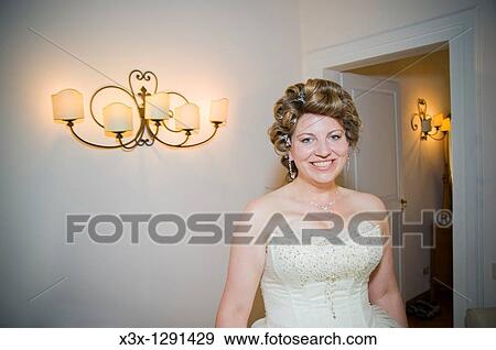Young happy bride in curlers View Large Photo Image Stock Photo - Young happy bride in curlers. Fotosearch