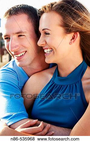 Stock Photo - Young happy couple. Fotosearch
