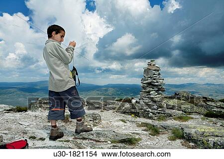 Young hiker in Torozo summit Sierra de Gredos? vila province Castilla y Le? n Spain View Large Photo Image Picture - Young hiker in Torozo summit Sierra de Gredos? vila province Castilla y Le? n Spain. Fotosearch