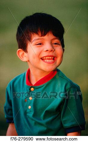 Stock Image - Young hispanic boy. Chelsea. Massachusetts. USA. Fotosearch