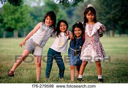 Stock Photo - Young hispanic girls. Chelsea. Massachusetts. USA. Fotosearch