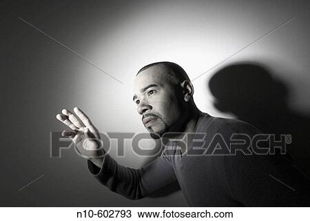Young Hispanic man, with a mustache and beard, posing View Large Photo Image Stock Image - Young Hispanic man, with a mustache and beard, posing. Fotosearch