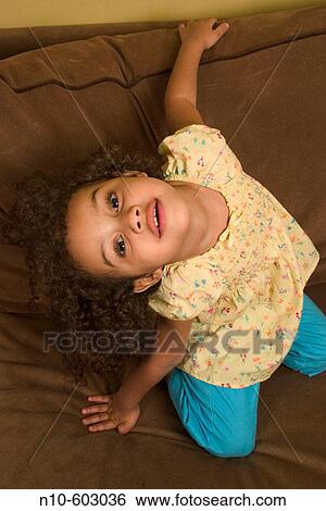 Young Hispanic/Italian girl posing. View Large Photo Image Stock Photograph - Young Hispanic/Italian girl posing.. Fotosearch