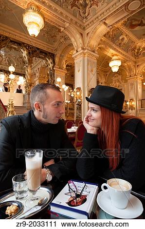 Young Hungagian couple in opulent New York Cafe, a 19th century coffee house frequented by writers, in Budapest, Hungary. View Large Photo Image Stock Image - Young Hungagian couple in opulent New York Cafe, a 19th century coffee house frequented by writers, in Budapest, Hungary.. Fotosearch