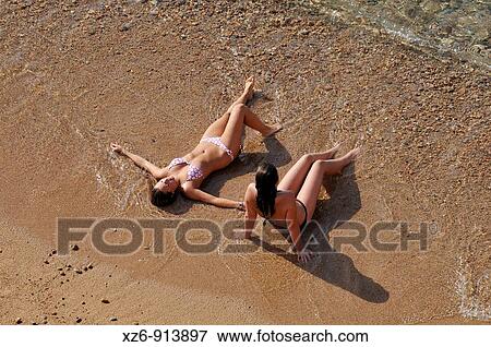 young in the beach View Large Photo Image Stock Photo - young in the beach. Fotosearch