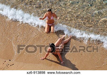 young in the beach View Large Photo Image Stock Photo - young in the beach. Fotosearch