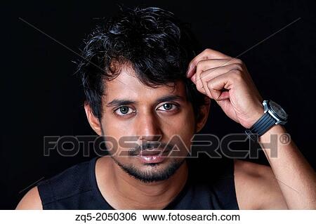 Young Indian male thinking. Pune India View Large Photo Image Stock Photograph - Young Indian male thinking. Pune India. Fotosearch