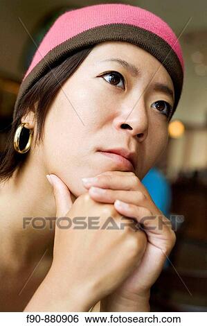 Stock Photograph - Young Japanese woman in coffeeshop. Fotosearch