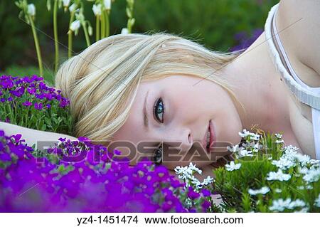 Picture - Young lady at the park. Fotosearch