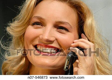 Young lady having a phone call. View Large Photo Image Stock Image - Young lady having a phone call.. Fotosearch
