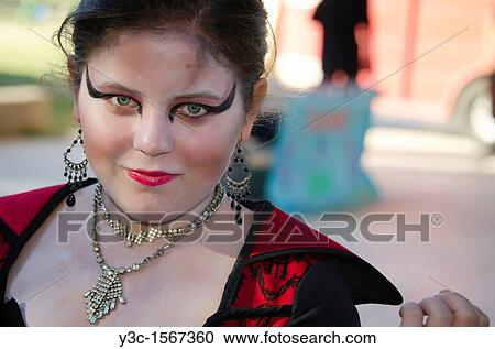 Young lady in female vampire Halloween costume View Large Photo Image Stock Image - Young lady in female vampire Halloween costume. Fotosearch
