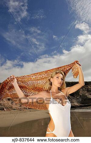 Young lady loog the shoreline View Large Photo Image Picture - Young lady loog the shoreline. Fotosearch