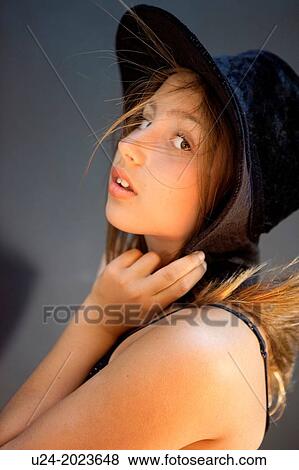Young Lady with Hat. View Large Photo Image Stock Photo - Young Lady with Hat.. Fotosearch