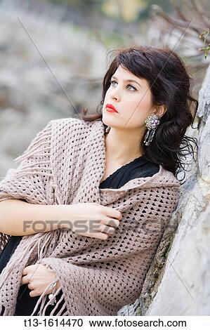 Young lady with Red lips and ear-rings View Large Photo Image Stock Image - Young lady with Red lips and ear-rings. Fotosearch