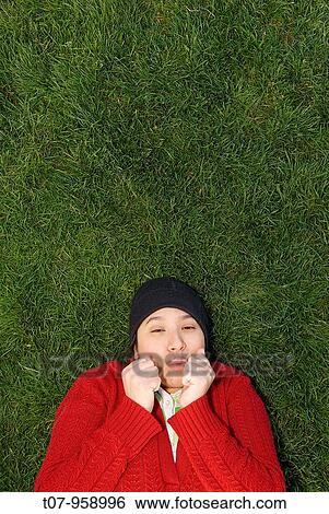 Young latino woman with read sweater View Large Photo Image Stock Photograph - Young latino woman with read sweater. Fotosearch