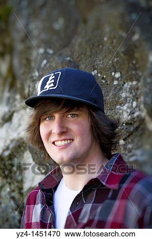 Young male at local park View Large Photo Image Stock Image - Young male at local park. Fotosearch