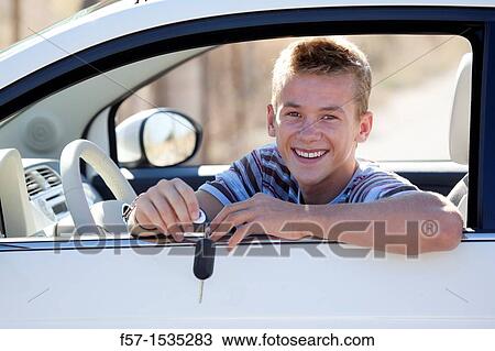 Young male learner driver View Large Photo Image Stock Image - Young male learner driver. Fotosearch