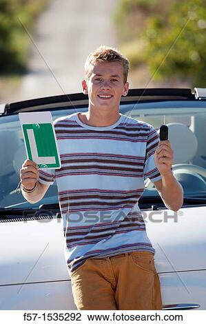 Young male learner driver View Large Photo Image Stock Image - Young male learner driver. Fotosearch