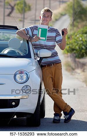 Young male learner driver View Large Photo Image Stock Image - Young male learner driver. Fotosearch