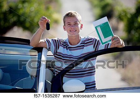 Young male learner driver View Large Photo Image Stock Photo - Young male learner driver. Fotosearch