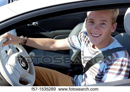 Young male learner driver View Large Photo Image Stock Photo - Young male learner driver. Fotosearch