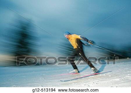 Young man, age 13, nordic skiing at night. View Large Photo Image Picture - Young man, age 13, nordic skiing at night.. Fotosearch