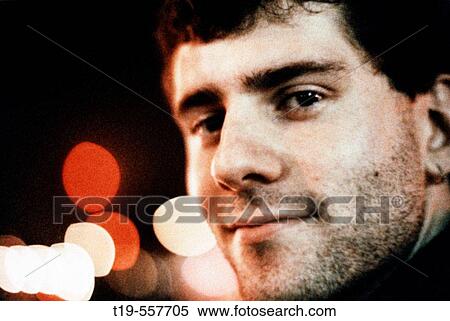 Young man enjoying a night on the town View Large Photo Image Stock Photography - Young man enjoying a night on the town. Fotosearch