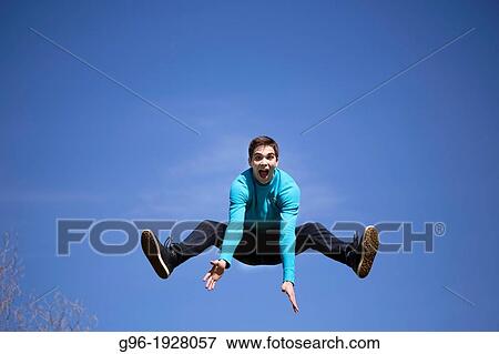 Stock Photo - Young man having fun. Fotosearch