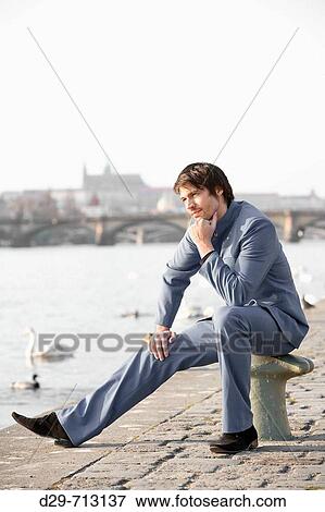 Young man in suit View Large Photo Image Stock Photo - Young man in suit. Fotosearch