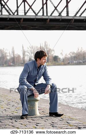 Young man in suit View Large Photo Image Stock Photograph - Young man in suit. Fotosearch