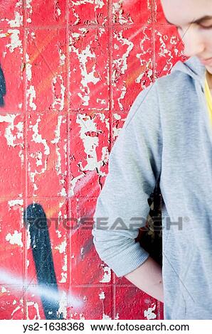 Young man in urban setting View Large Photo Image Stock Photo - Young man in urban setting. Fotosearch