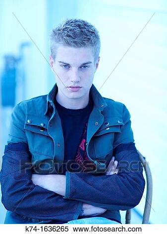 young man looking at viewer View Large Photo Image Stock Photography - young man looking at viewer. Fotosearch