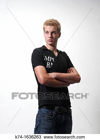 young man looking off camera View Large Photo Image Stock Image - young man looking off camera. Fotosearch