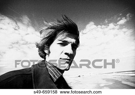 Young man on beach, Valencia. Comunidad Valenciana, Spain View Large Photo Image Stock Photo - Young man on beach, Valencia. Comunidad Valenciana, Spain. Fotosearch