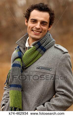 Picture - young man outdoors. Fotosearch