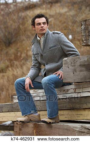 Stock Image - young man outdoors. Fotosearch