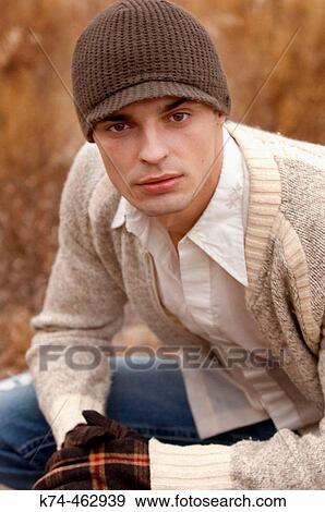Stock Photo - young man outdoors. Fotosearch