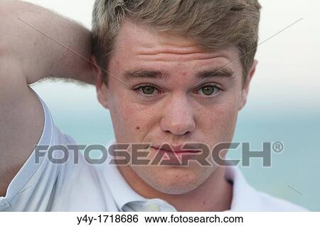 Stock Photograph - Young man portrait. Fotosearch
