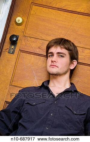 Young man posing. View Large Photo Image Stock Photo - Young man posing.. Fotosearch