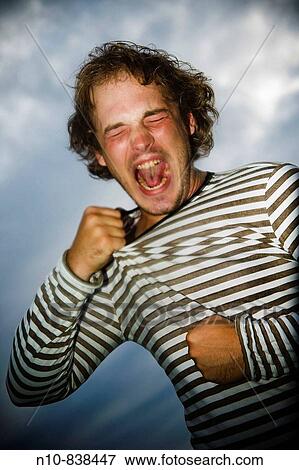 Stock Photo - Young man posing.. Fotosearch
