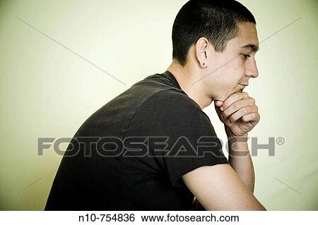 Young man posing. View Large Photo Image Stock Photograph - Young man posing.. Fotosearch