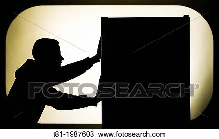 Young man pushing View Large Photo Image Stock Image - Young man pushing. Fotosearch